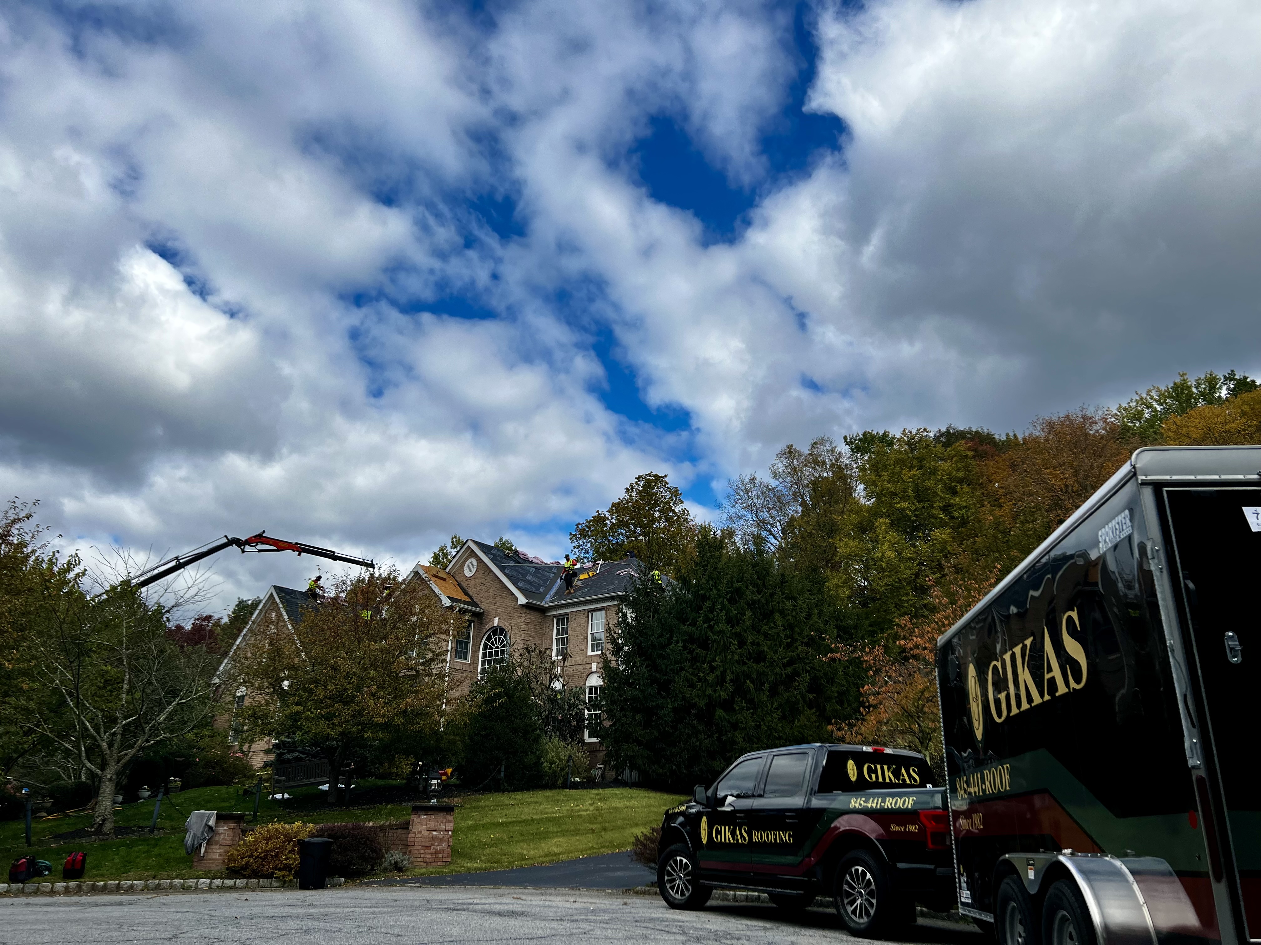 Gikas Roofing Trucks